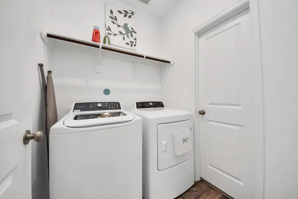 a utility room with dryer and washer