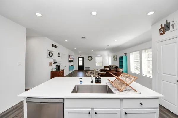 a view of living room with furniture and window