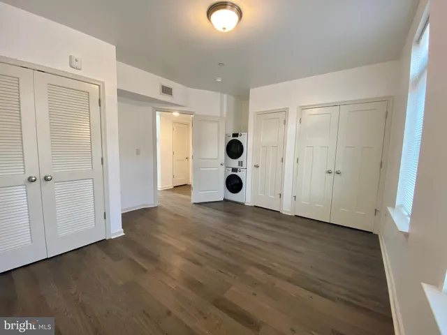 a bathroom with a shower toilet and bathtub