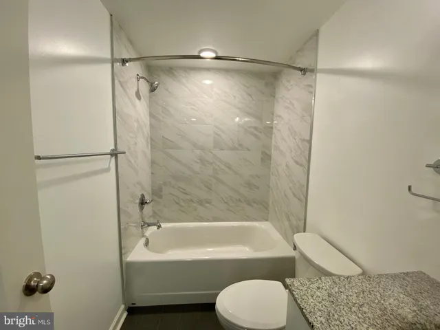 a view of a hallway with windows