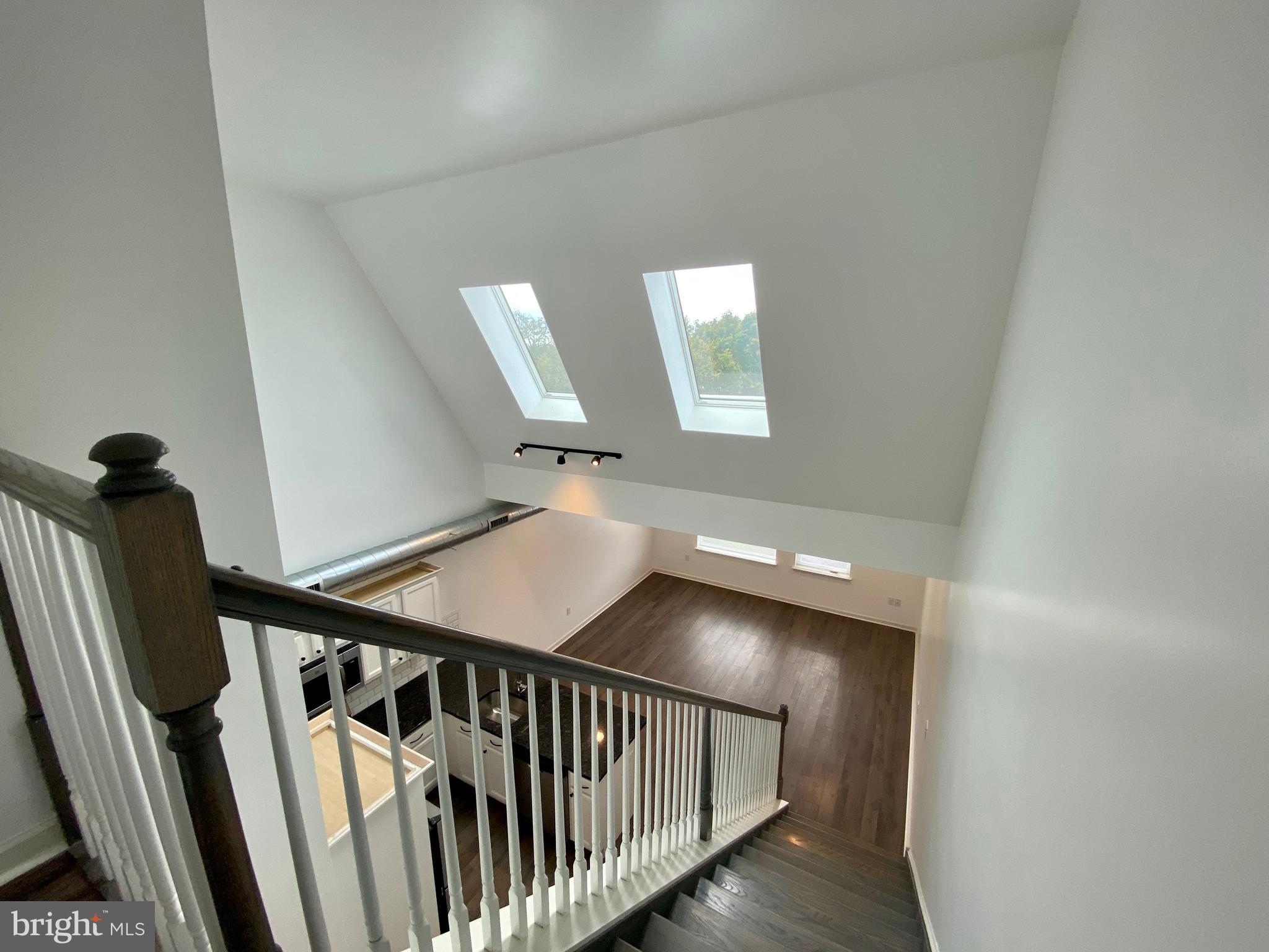 6615 Ridge Avenue, Unit 105 Philadelphia, PA 19128 - Photo 10 of 14 a view of a hallway with windows