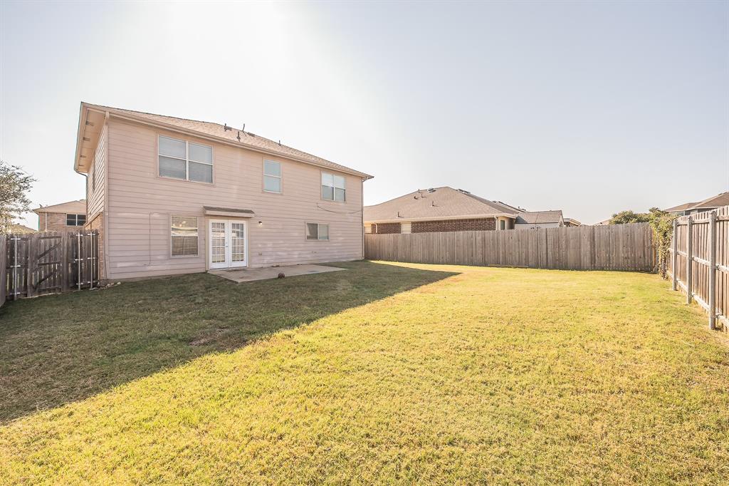 146 Independence Avenue Venus, TX 76084 - Photo 21 of 21 a house view with swimming pool in front of it