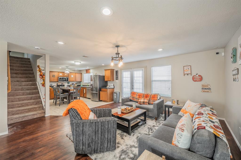 146 Independence Avenue Venus, TX 76084 - Photo 3 of 21 a living room with furniture and wooden floor
