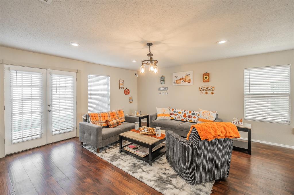146 Independence Avenue Venus, TX 76084 - Photo 4 of 21 a living room with furniture and wooden floor