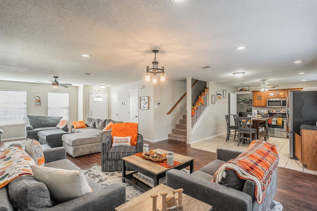 146 Independence Avenue Venus, TX 76084 - Photo 6 of 21 a living room with furniture and wooden floor