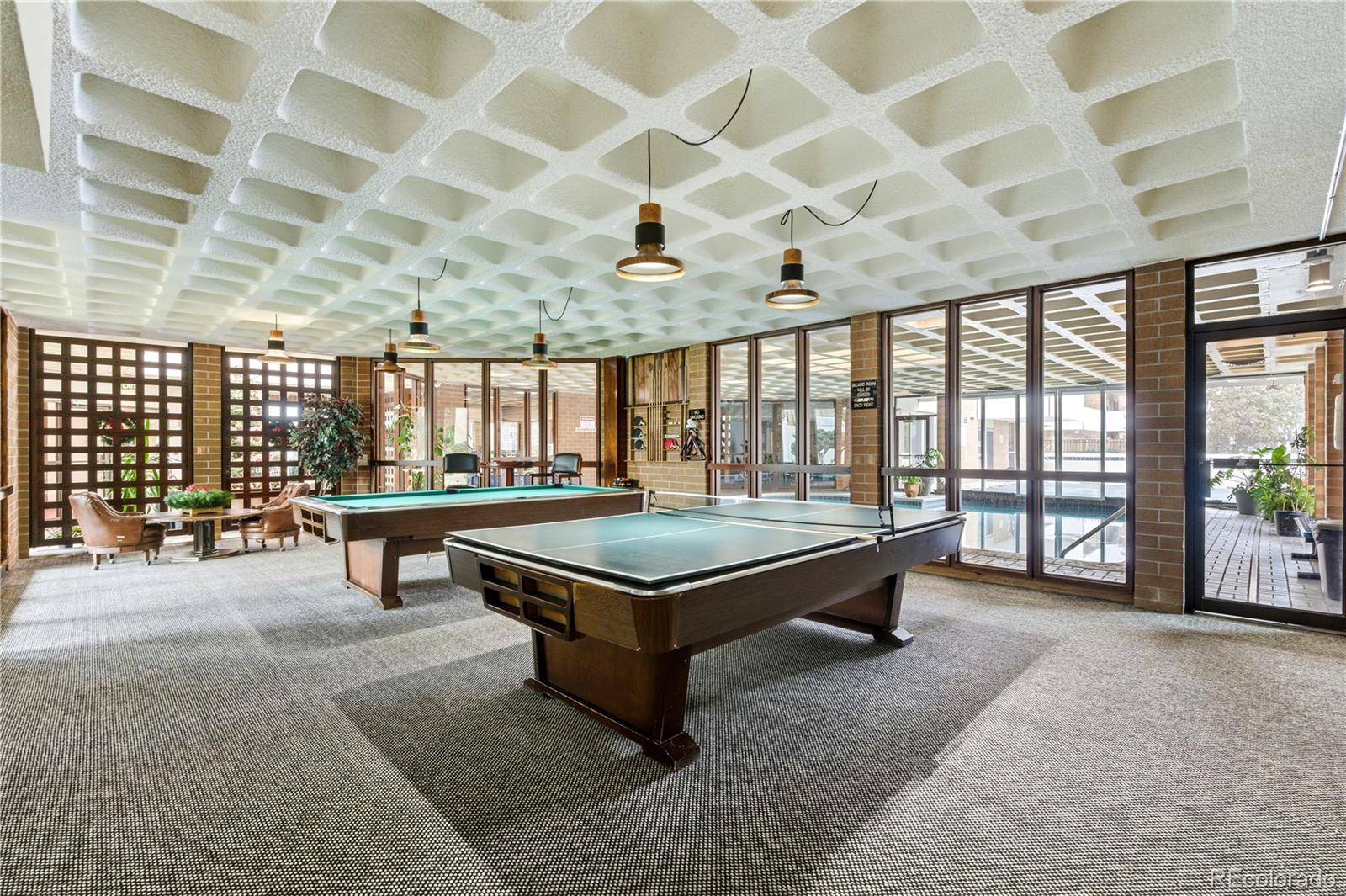 2880 South Locust Street, Unit 200S Denver, CO 80222 - Photo 29 of 43 a room with pool table and windows