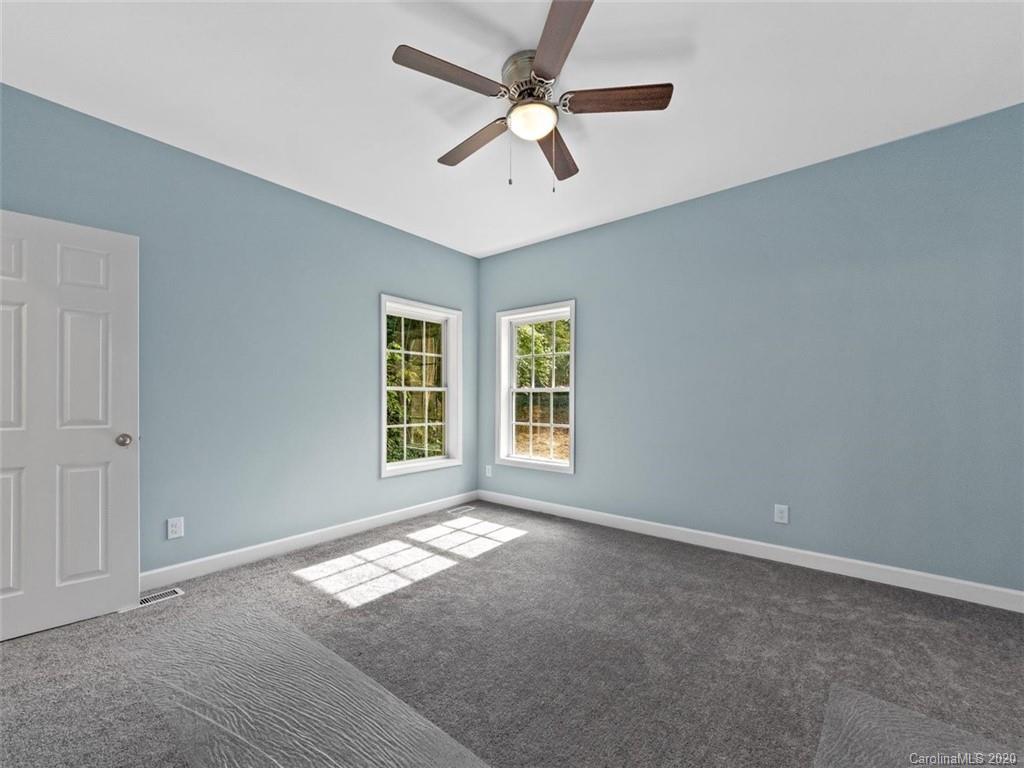 80 Sand Hill Road Asheville, NC 28806 - Photo 16 of 28 a view of an empty room with a window