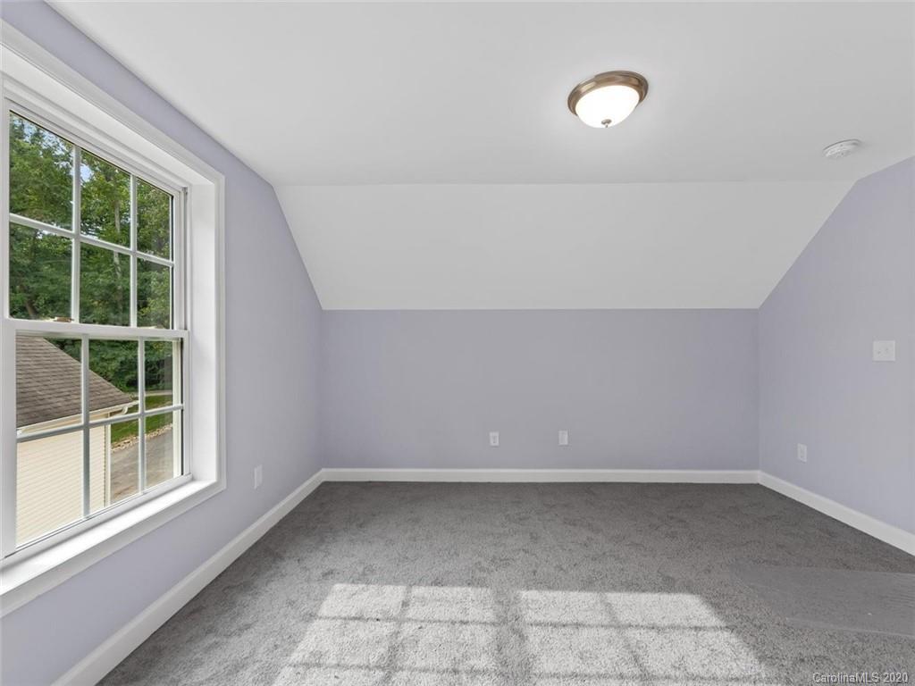 80 Sand Hill Road Asheville, NC 28806 - Photo 21 of 28 an empty room with a window