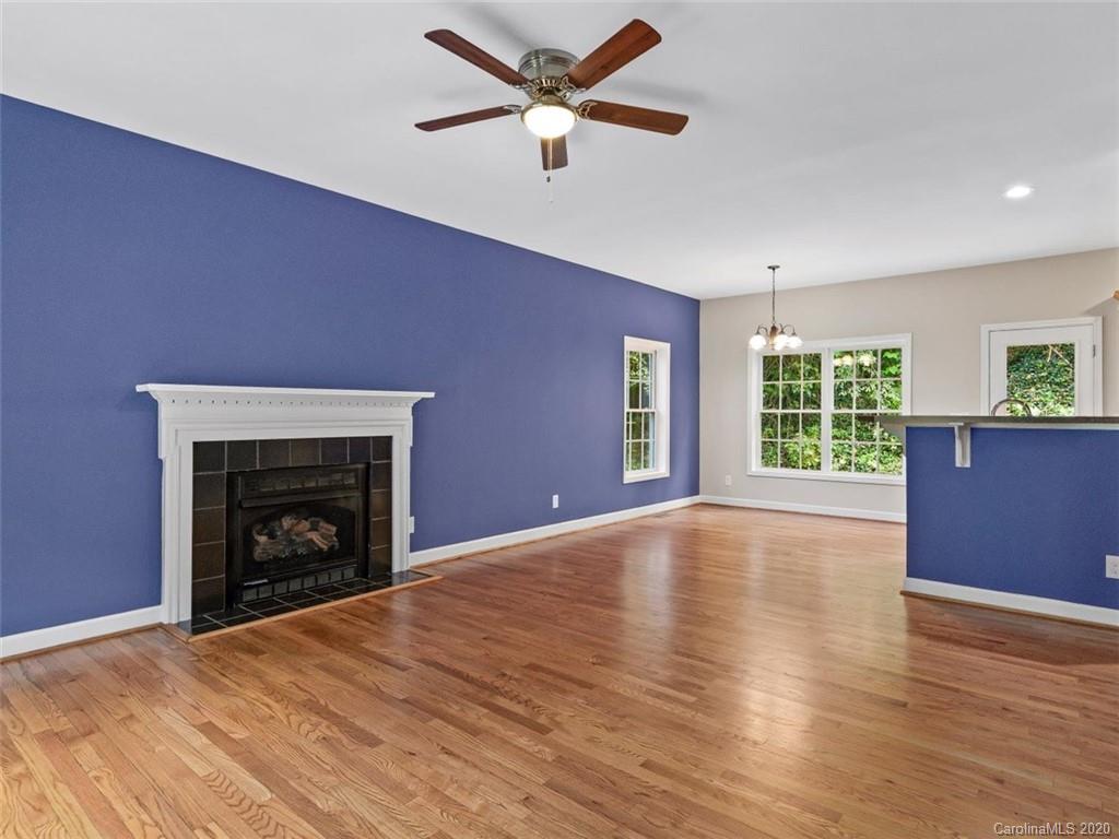 80 Sand Hill Road Asheville, NC 28806 - Photo 6 of 28 a view of empty room with wooden floor and fan