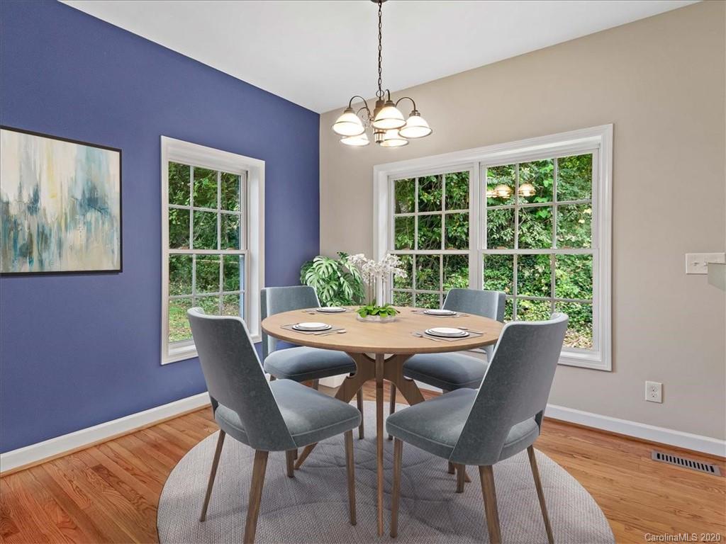80 Sand Hill Road Asheville, NC 28806 - Photo 9 of 28 a view of a dining room with furniture window and outside view