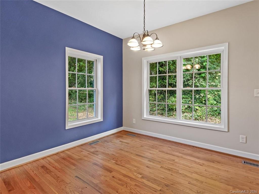 80 Sand Hill Road Asheville, NC 28806 - Photo 10 of 28 a view of an empty room with wooden floor and a window