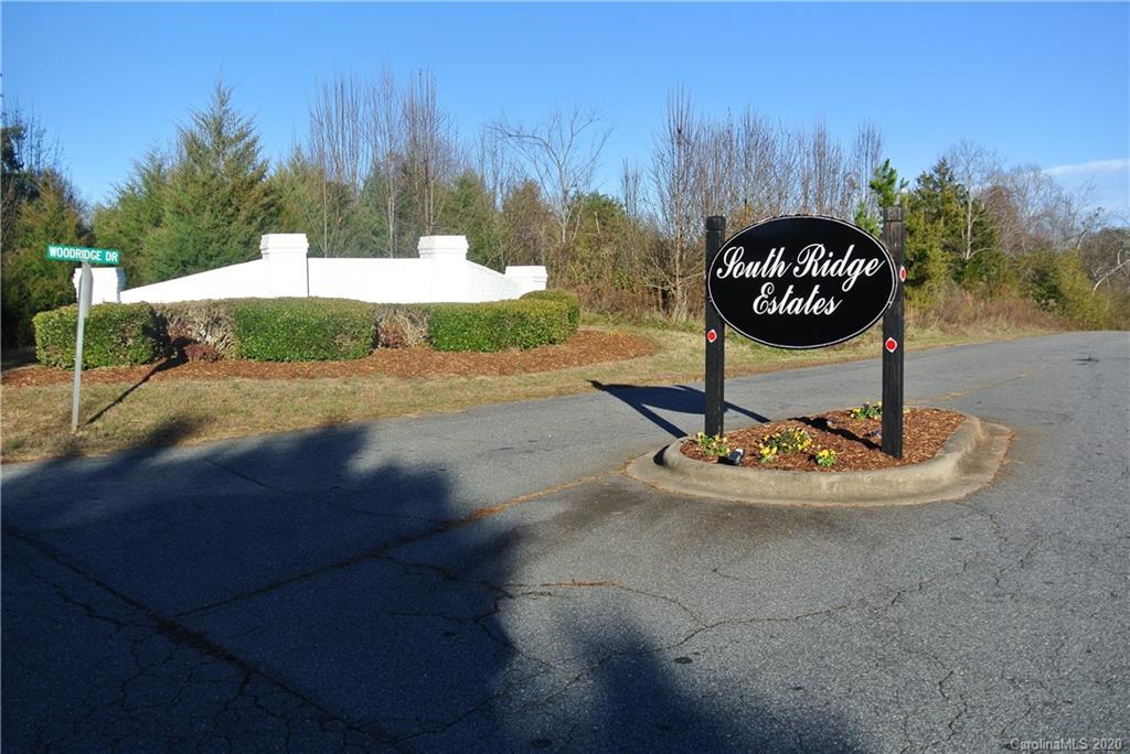 41 Beechtree Circle Rutherfordton, NC 28139 - Photo 1 of 1 a view of a street with a barn in the background