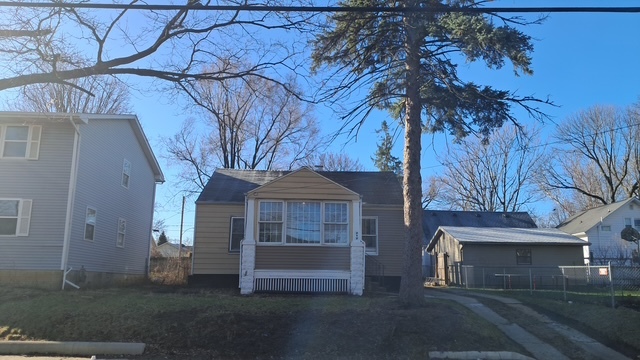 212 West Division Street Bloomington, IL 61701 - Photo 12 of 12 a front view of a house with a yard