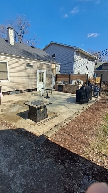 212 West Division Street Bloomington, IL 61701 - Photo 3 of 12 a view of a outdoor space with seating area