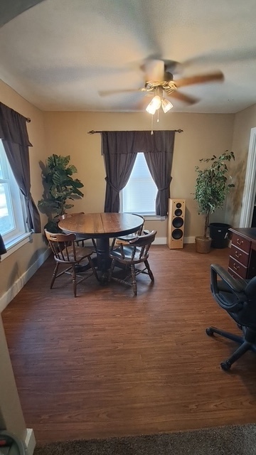 212 West Division Street Bloomington, IL 61701 - Photo 6 of 12 a living room with furniture and a wooden floor