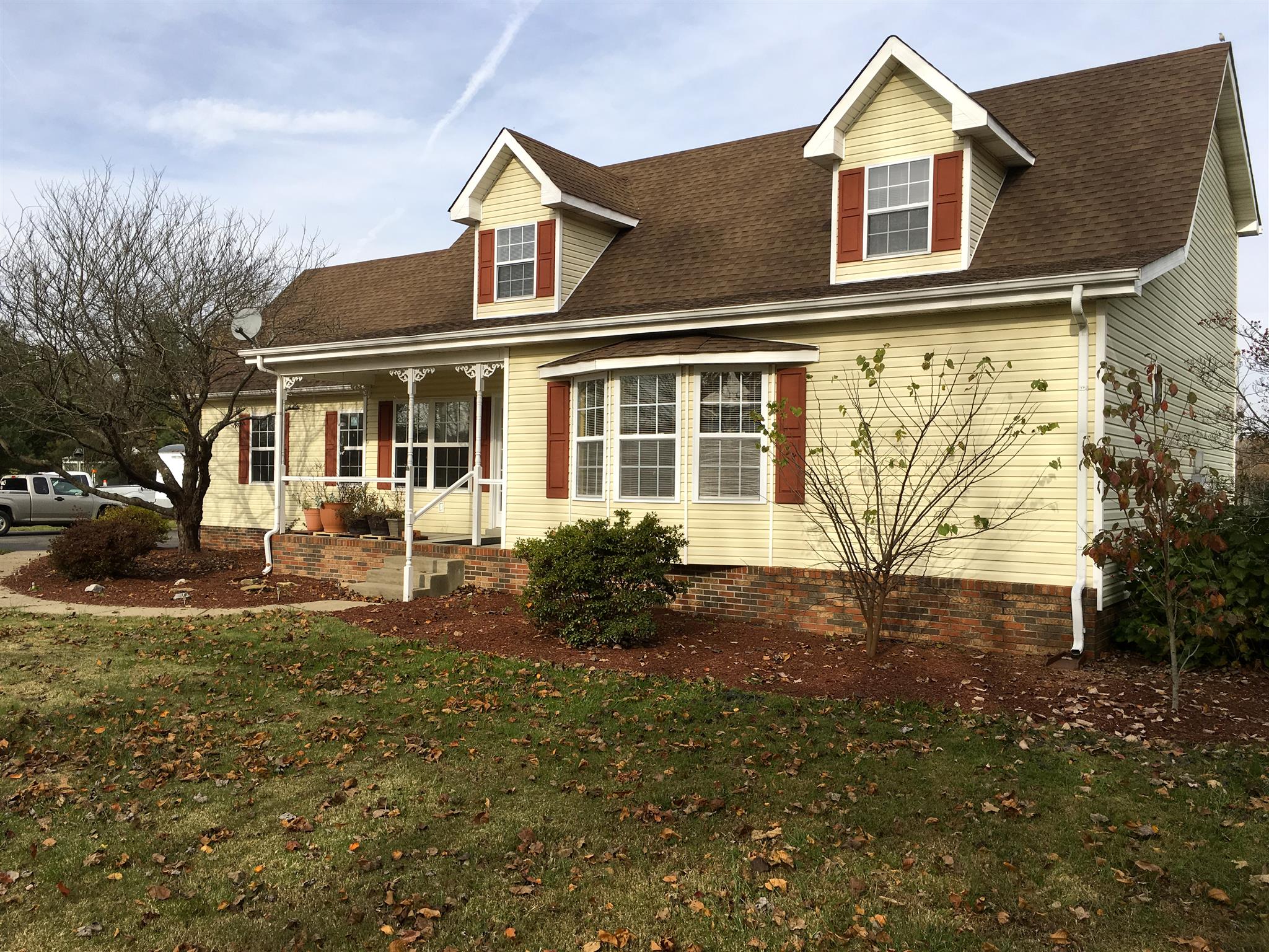 2735 New Hall Road Greenbrier, TN 37073 - Photo 2 of 26 a front view of a house with a yard