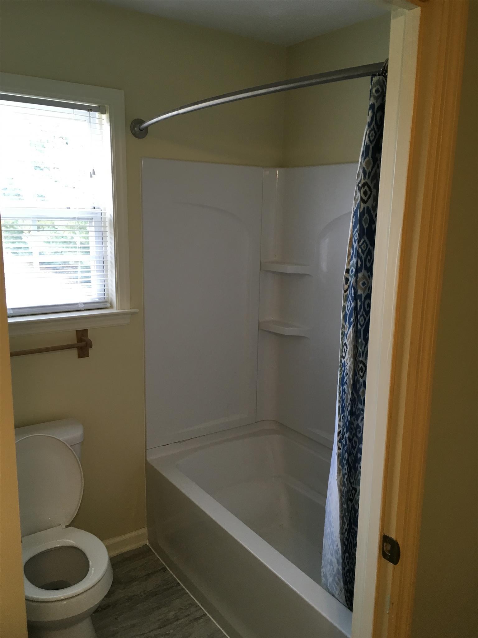 2735 New Hall Road Greenbrier, TN 37073 - Photo 21 of 26 a bathroom with a shower a toilet and a sink
