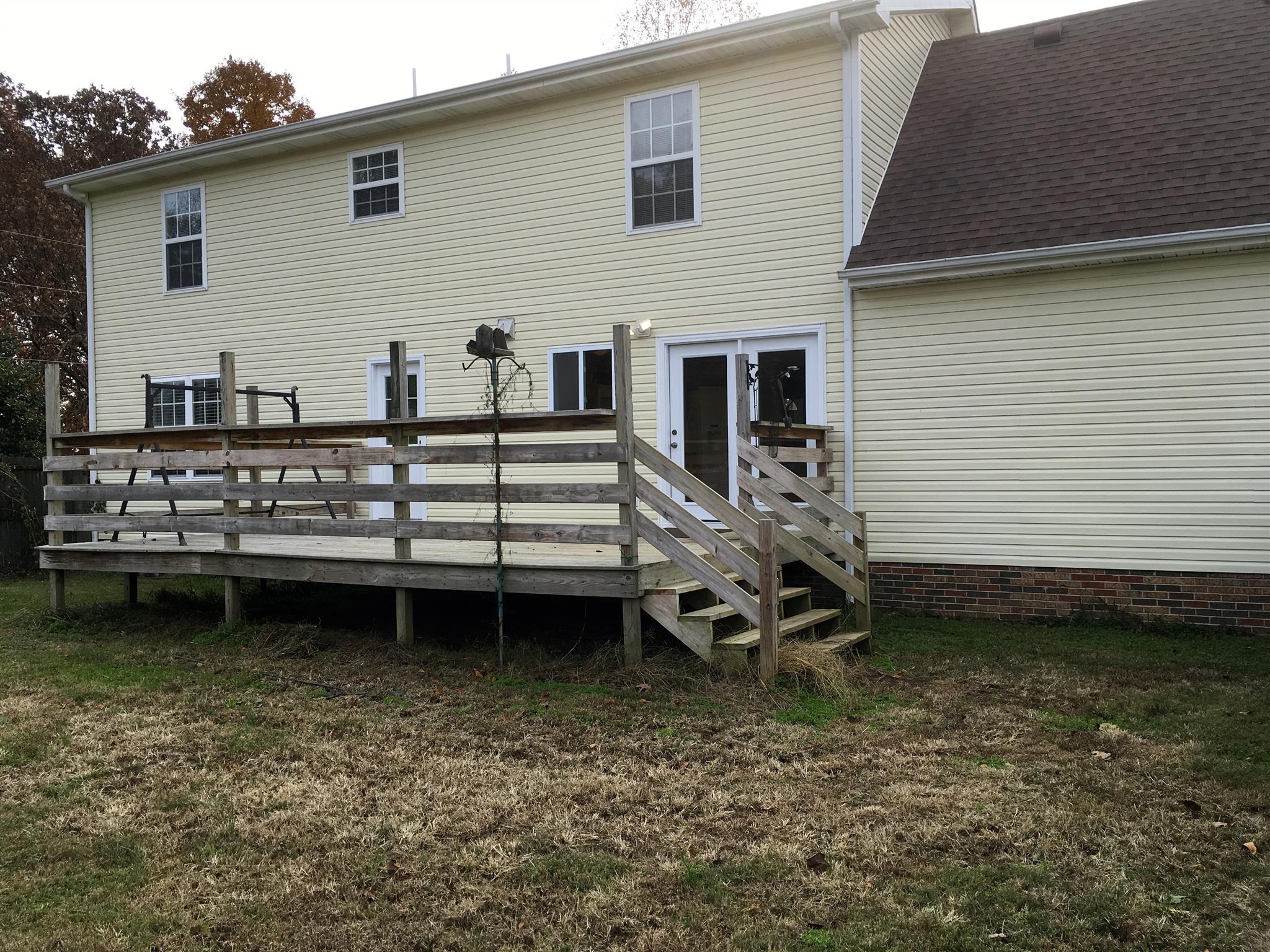 2735 New Hall Road Greenbrier, TN 37073 - Photo 6 of 26 a view of a house with backyard and sitting area