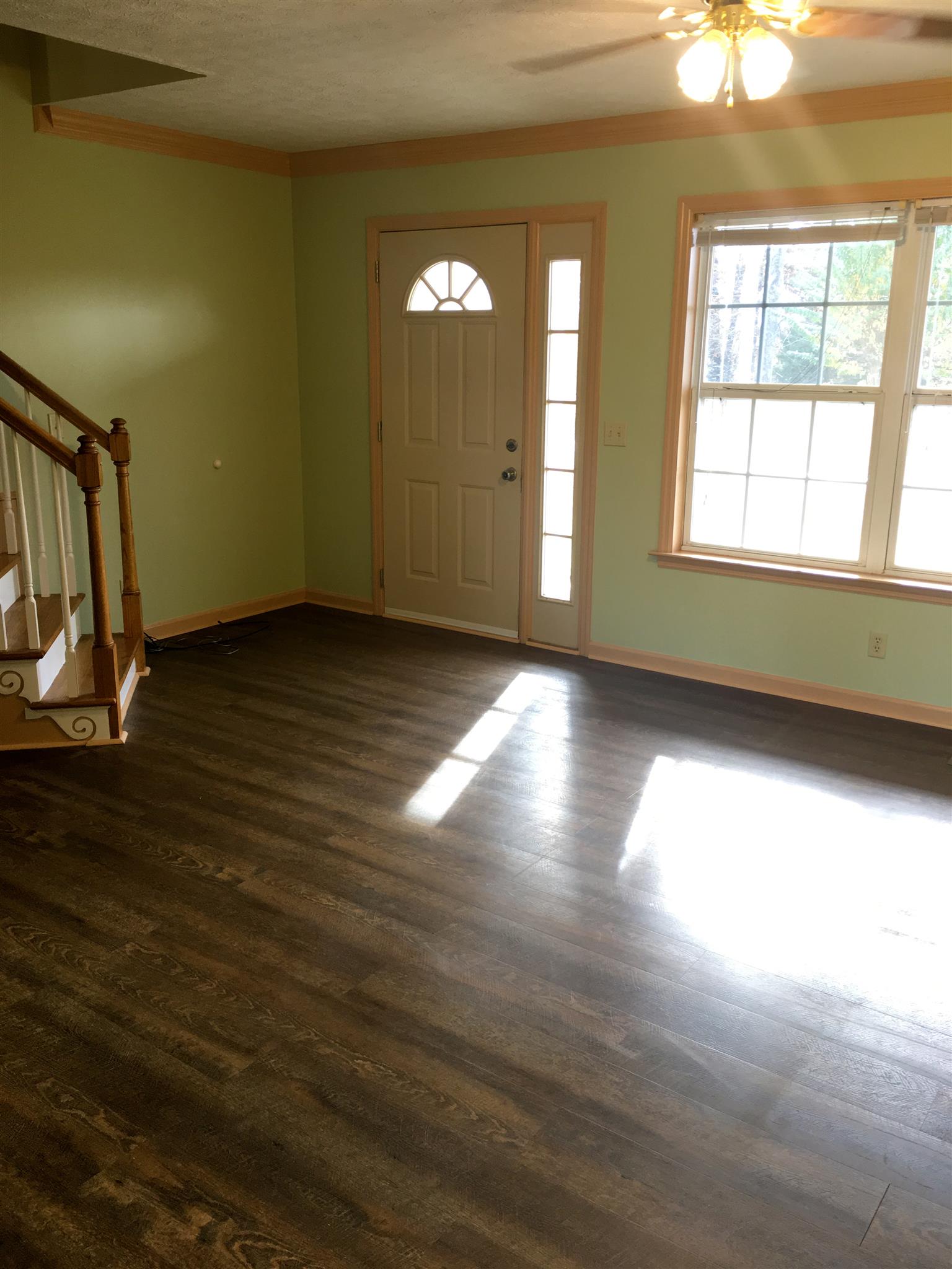 2735 New Hall Road Greenbrier, TN 37073 - Photo 7 of 26 a view of an empty room with window and wooden floor