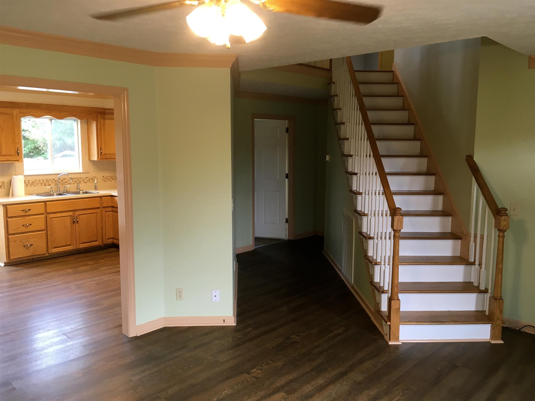 2735 New Hall Road Greenbrier, TN 37073 - Photo 8 of 26 a view of a hallway with wooden floor and entryway