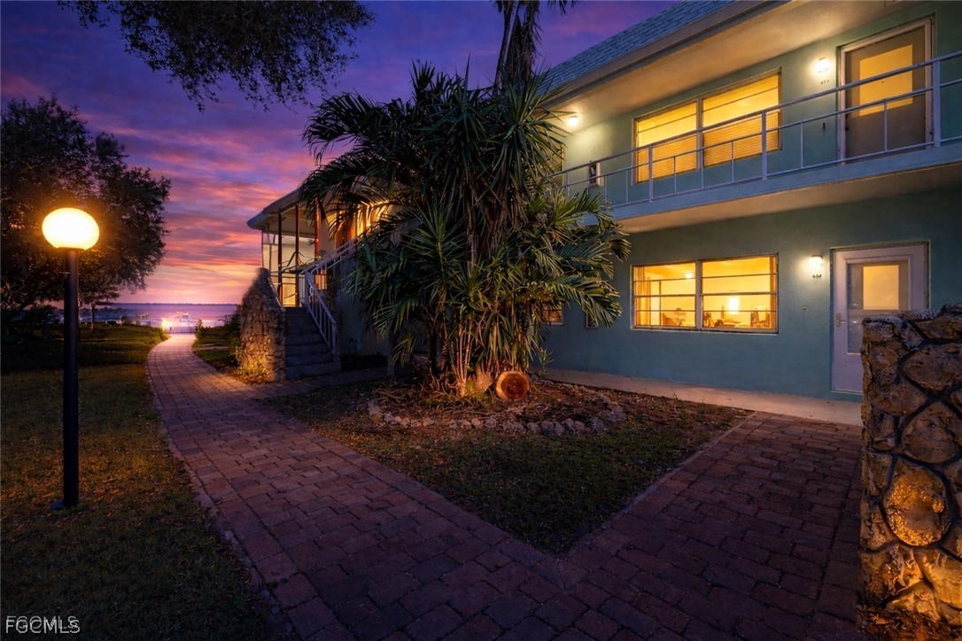 a view of a backyard of a house