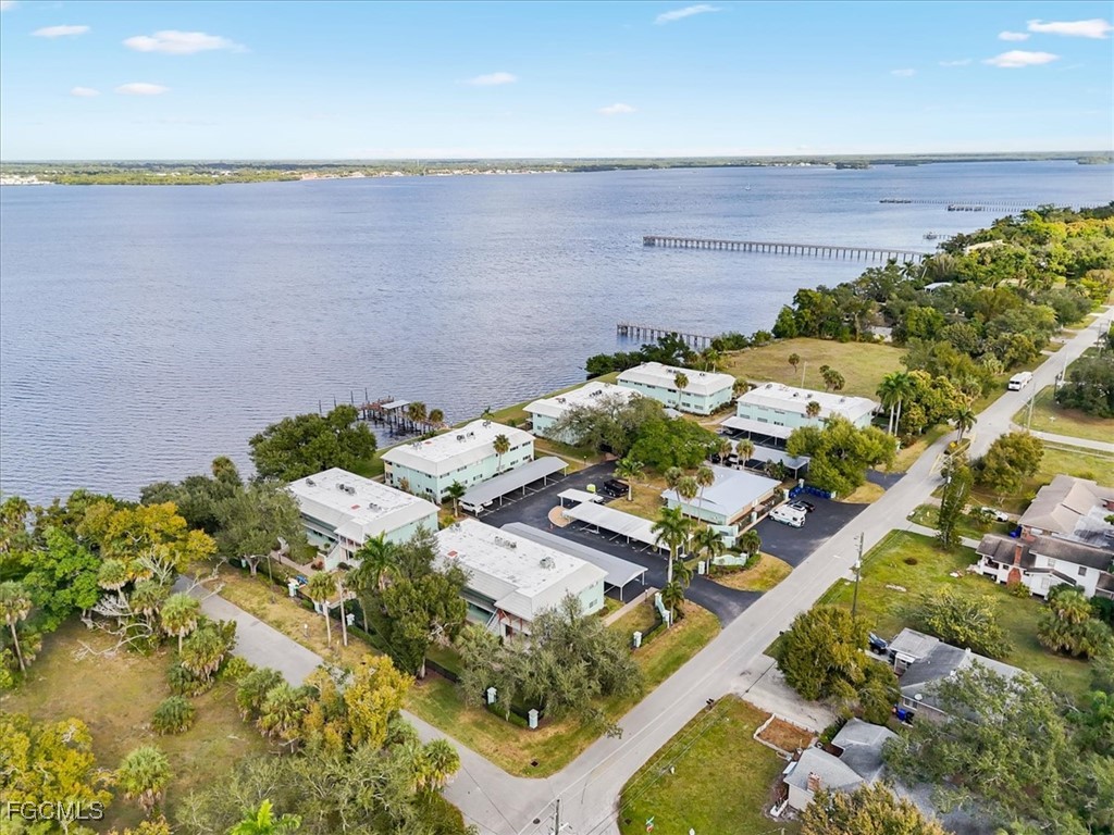 3225 East Riverside Drive, Unit 63F Fort Myers, FL 33905 - Photo 23 of 30 a view of lake view and mountain view