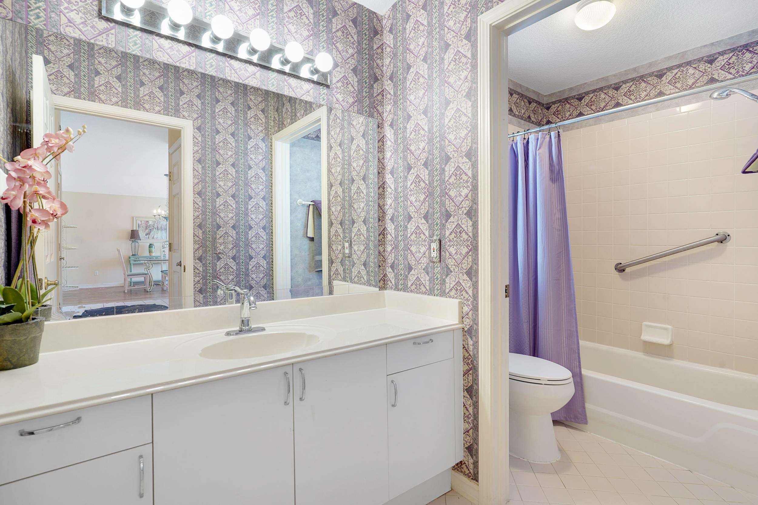 101 Marsh Place North St. Augustine, FL 32080 - Photo 13 of 42 a bathroom with a sink toilet and shower