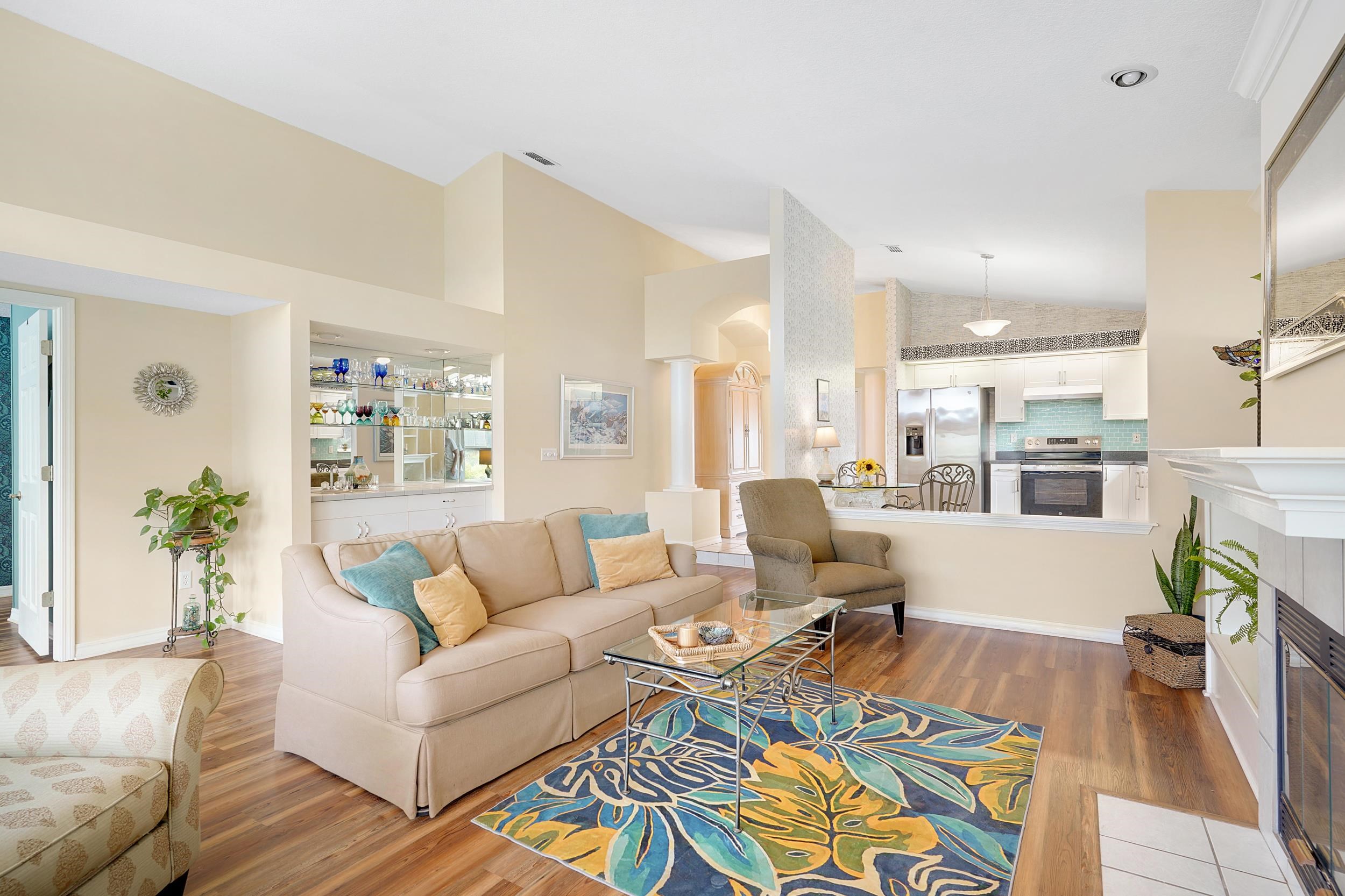 101 Marsh Place North St. Augustine, FL 32080 - Photo 20 of 42 a living room with furniture wooden floor and a large window