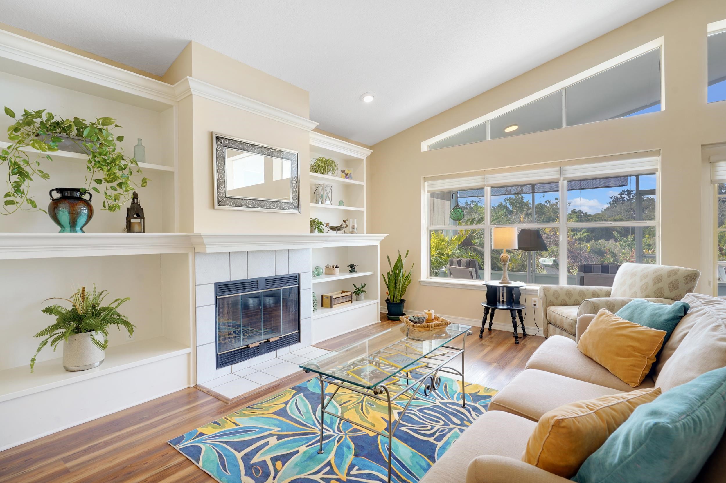 101 Marsh Place North St. Augustine, FL 32080 - Photo 22 of 42 a living room with furniture fireplace and a large window