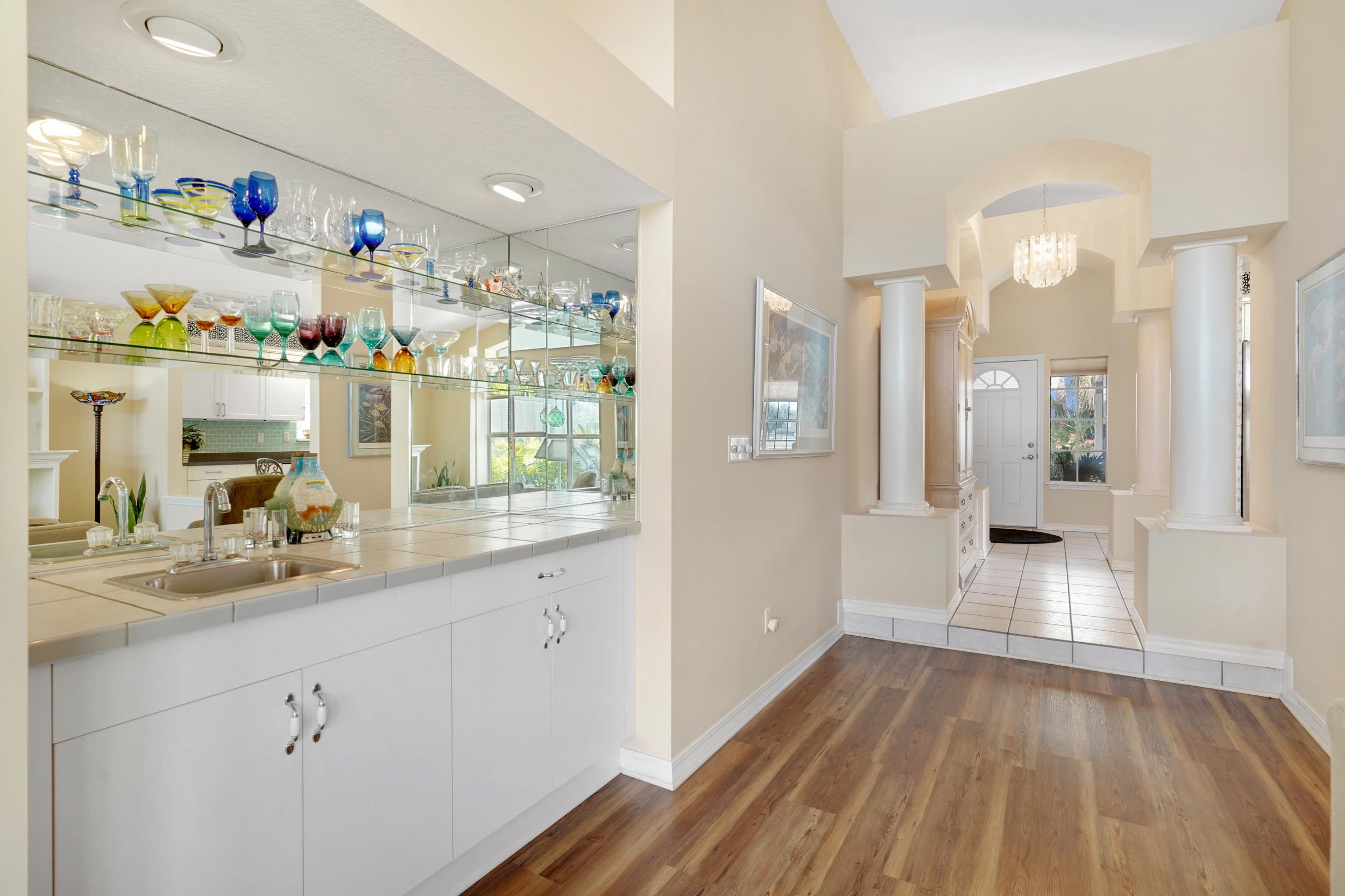 101 Marsh Place North St. Augustine, FL 32080 - Photo 23 of 42 a kitchen with cabinets and wooden floor