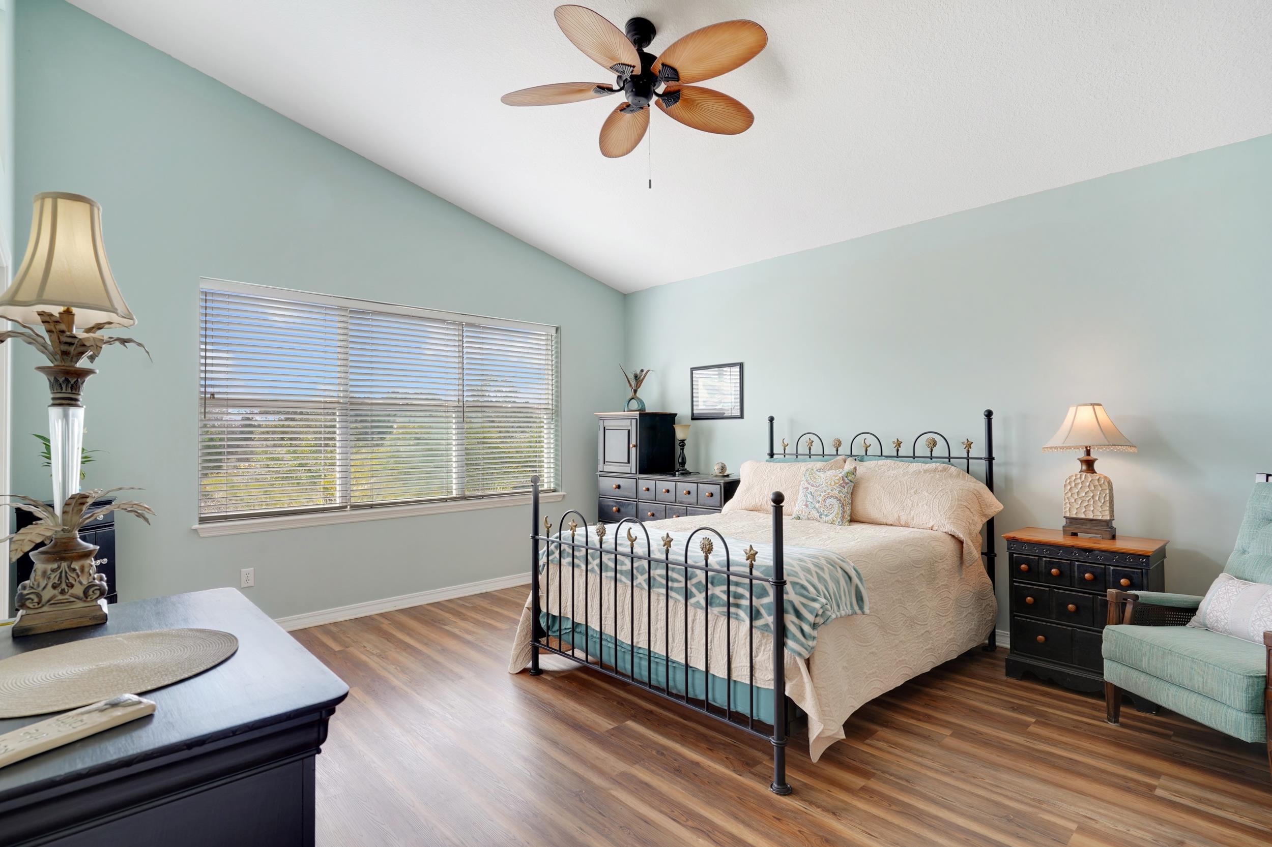 101 Marsh Place North St. Augustine, FL 32080 - Photo 24 of 42 a bedroom with a bed and wooden floor