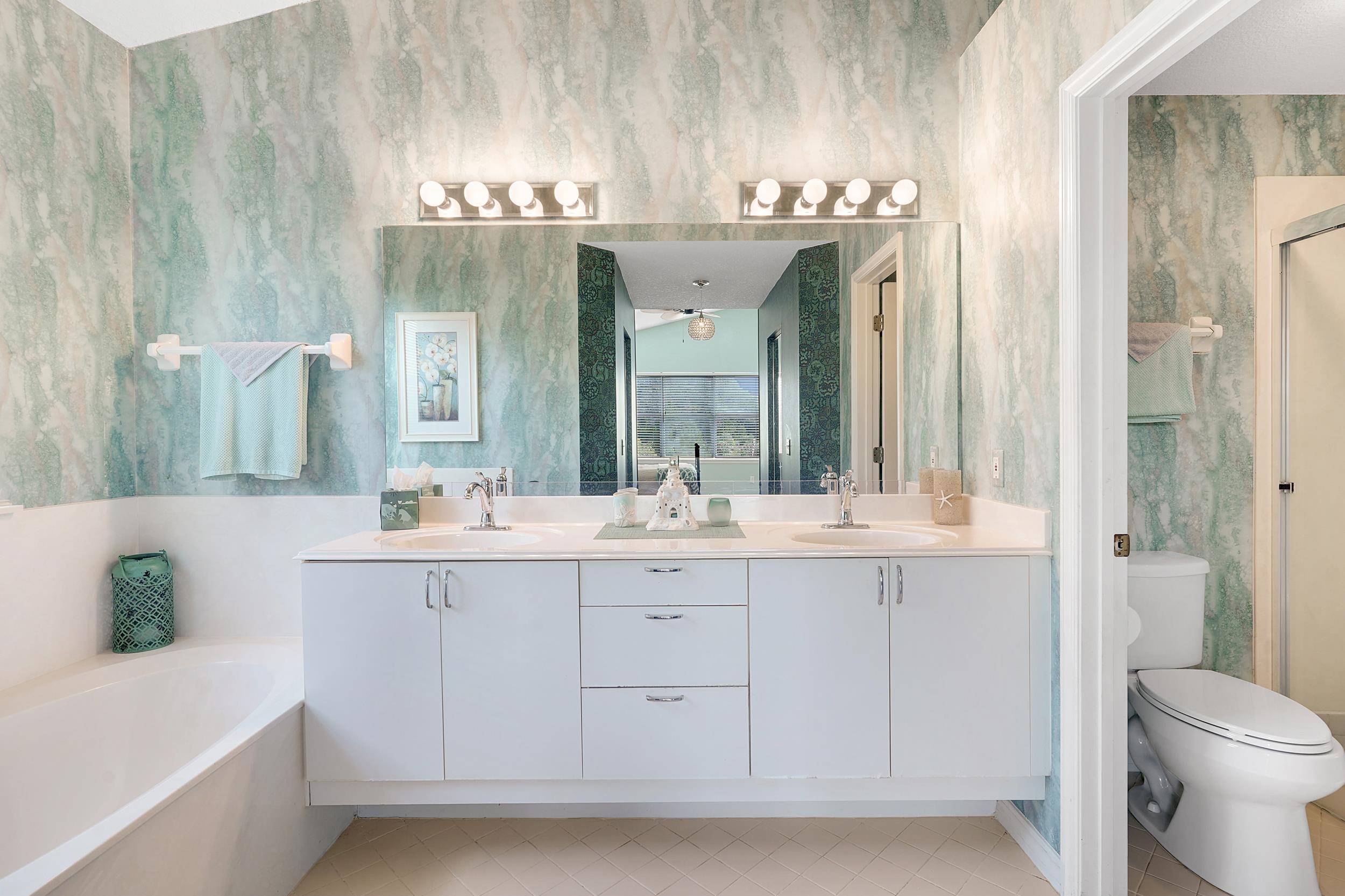 101 Marsh Place North St. Augustine, FL 32080 - Photo 28 of 42 a bathroom with a sink a toilet and shower