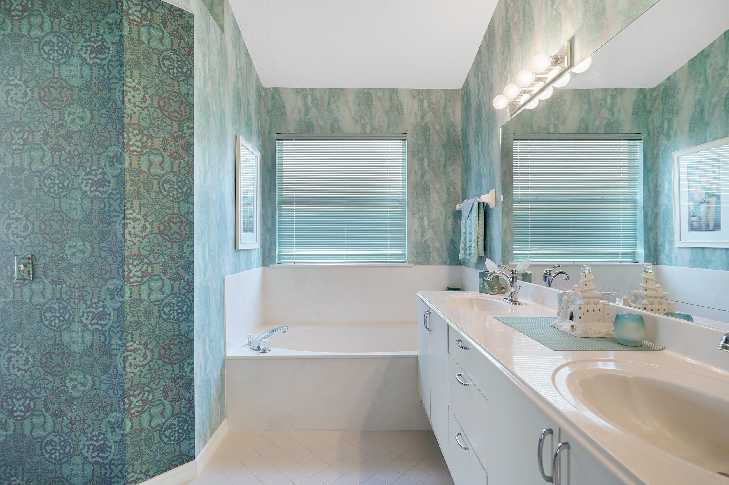101 Marsh Place North St. Augustine, FL 32080 - Photo 29 of 42 a bathroom with a bathtub and a sink
