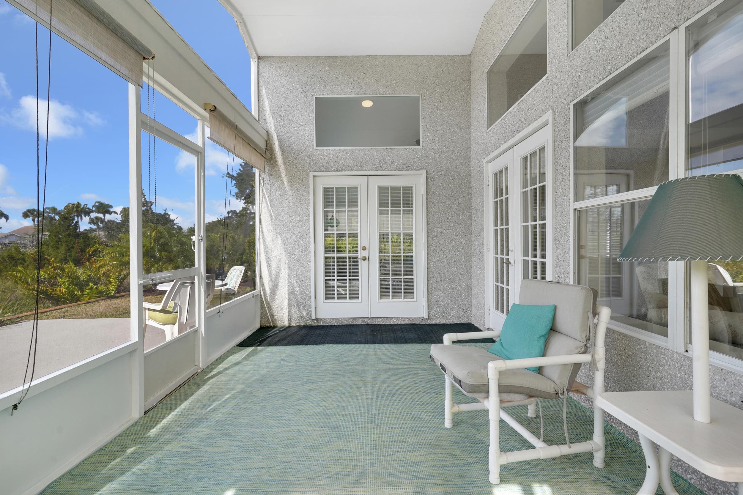 101 Marsh Place North St. Augustine, FL 32080 - Photo 30 of 42 a view of a house with a porch and furniture
