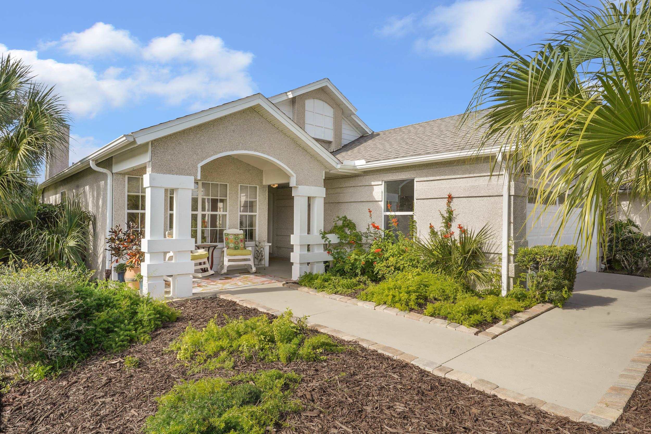 101 Marsh Place North St. Augustine, FL 32080 - Photo 38 of 42 a front view of a house with yard and porch