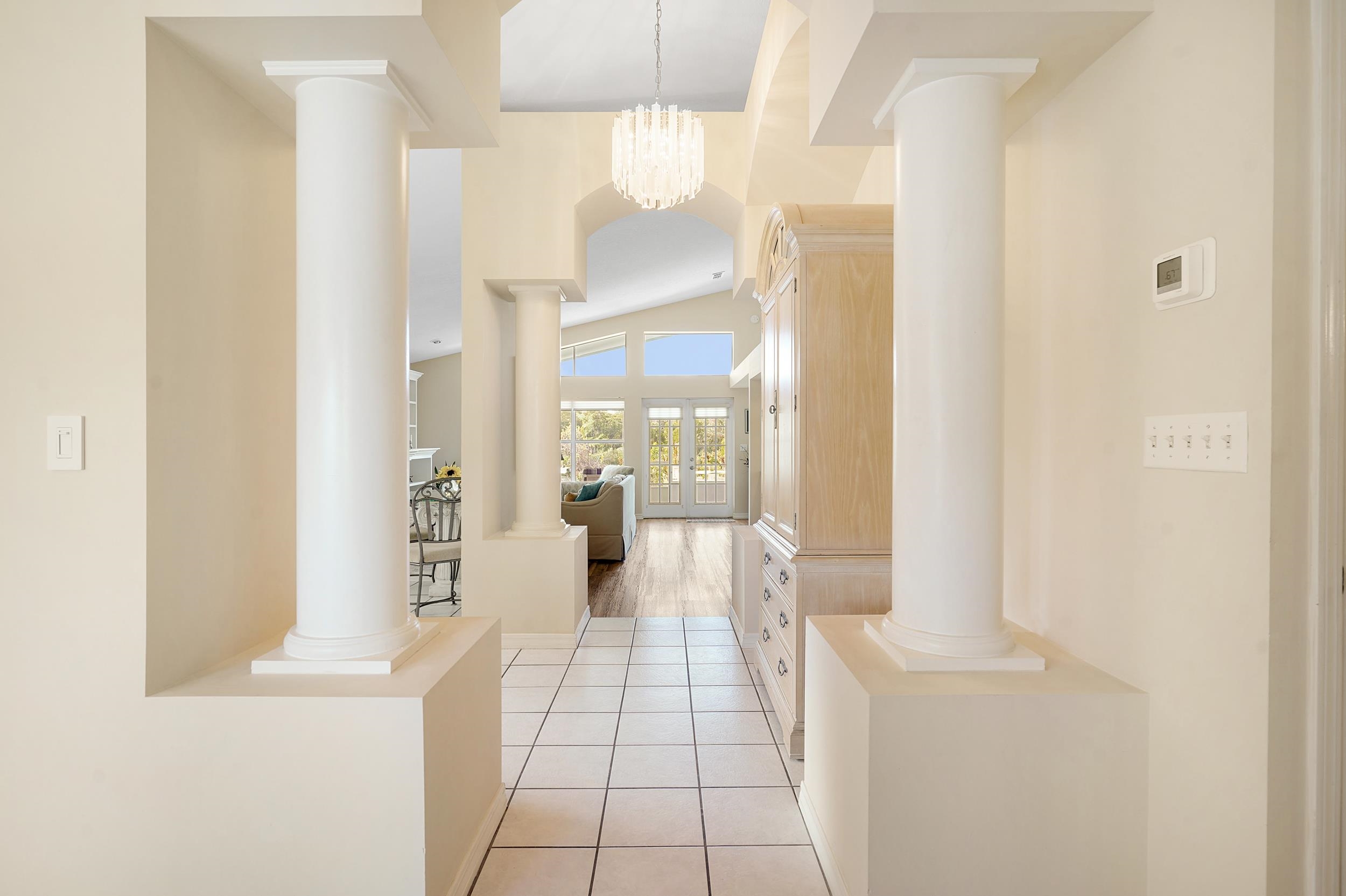 101 Marsh Place North St. Augustine, FL 32080 - Photo 8 of 42 a hallway with a view of living room with windows