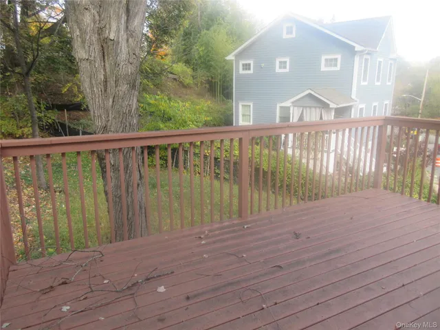 a view of a gate with a fence