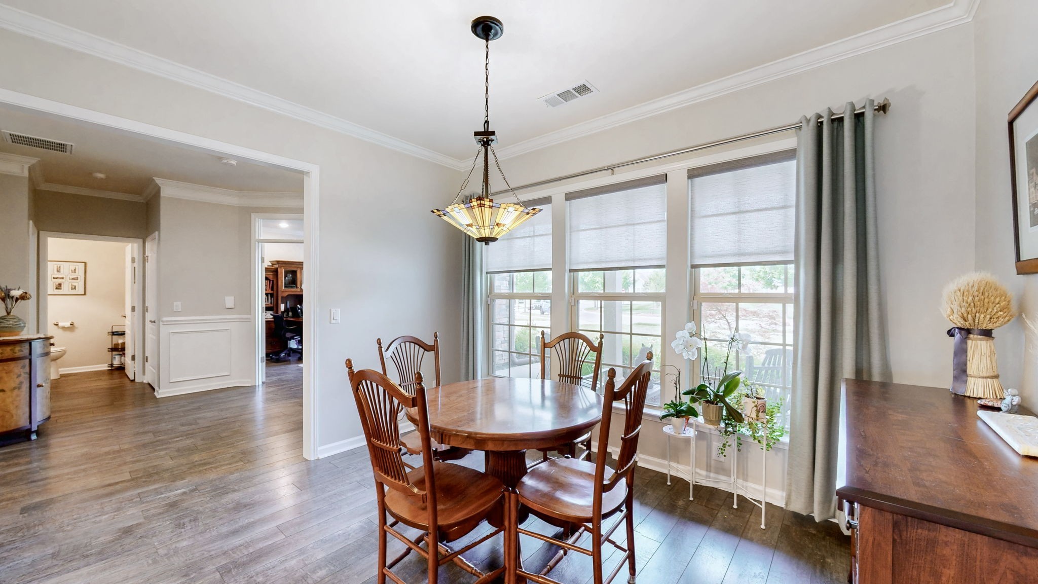 1106 Davidson Walk Spring Hill, TN 37174 - Photo 12 of 61 a view of a dining room with furniture window and wooden floor