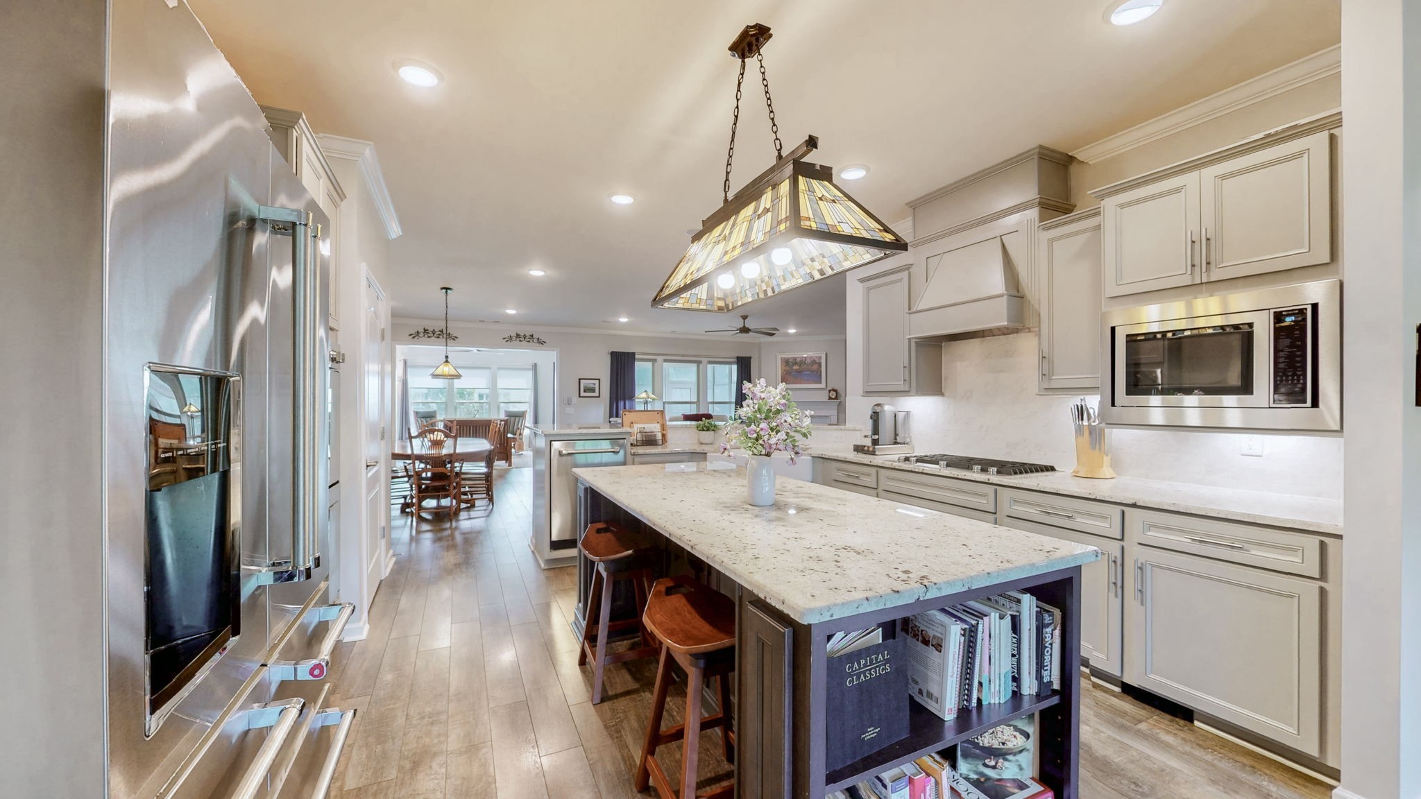 1106 Davidson Walk Spring Hill, TN 37174 - Photo 15 of 61 a kitchen with stainless steel appliances granite countertop a sink a stove and a refrigerator