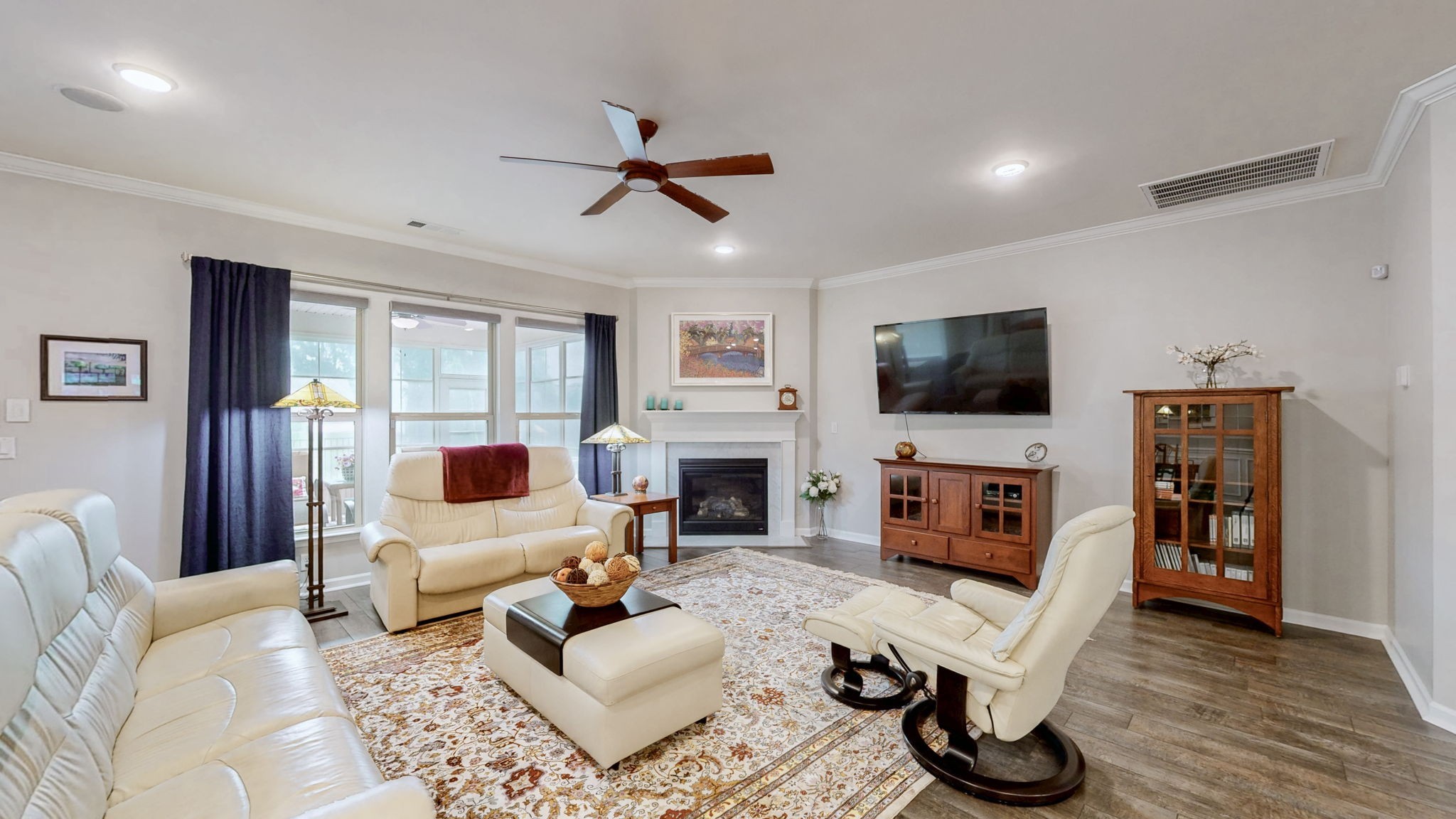 1106 Davidson Walk Spring Hill, TN 37174 - Photo 18 of 61 a living room with fireplace furniture and a flat screen tv