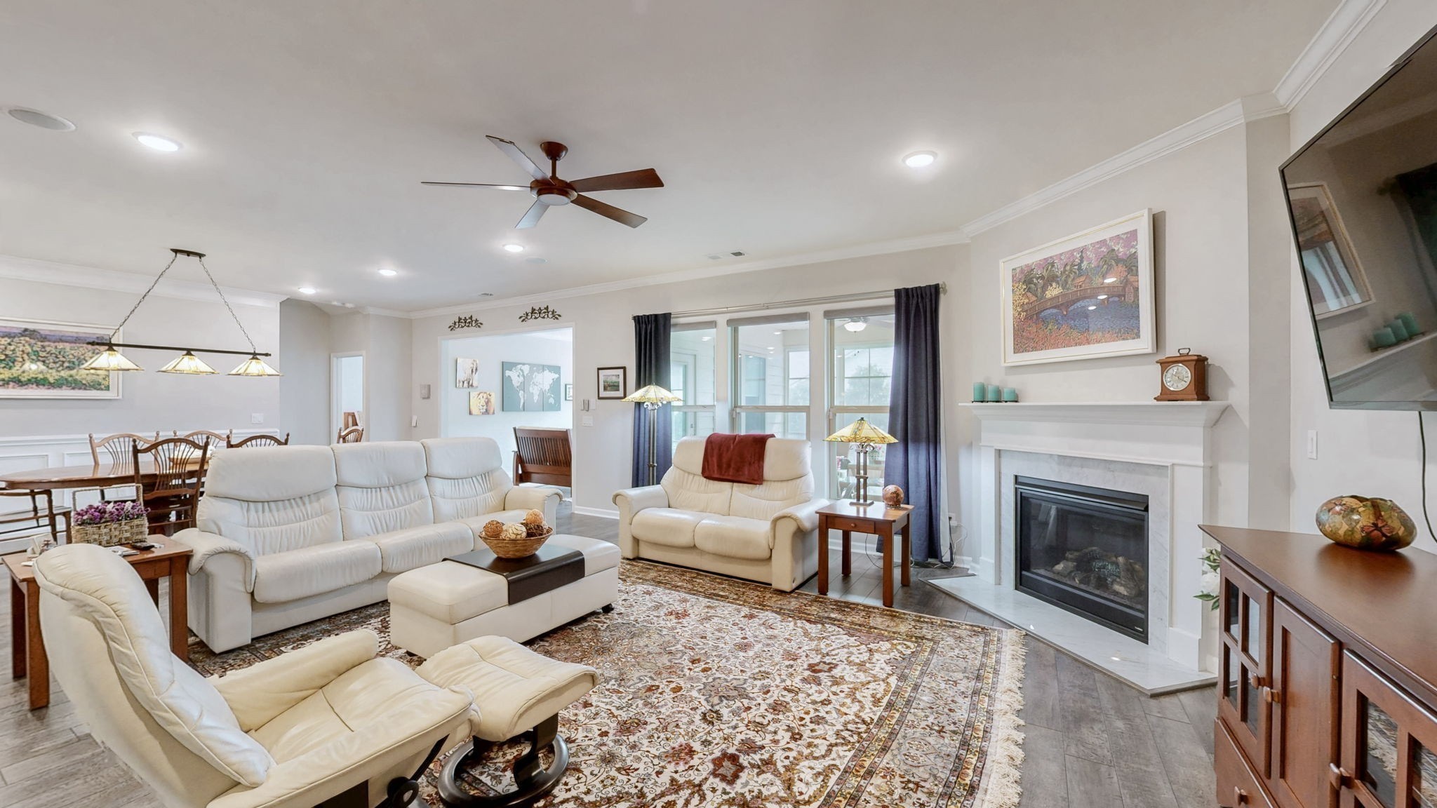 1106 Davidson Walk Spring Hill, TN 37174 - Photo 19 of 61 a living room with furniture a fireplace and a flat screen tv