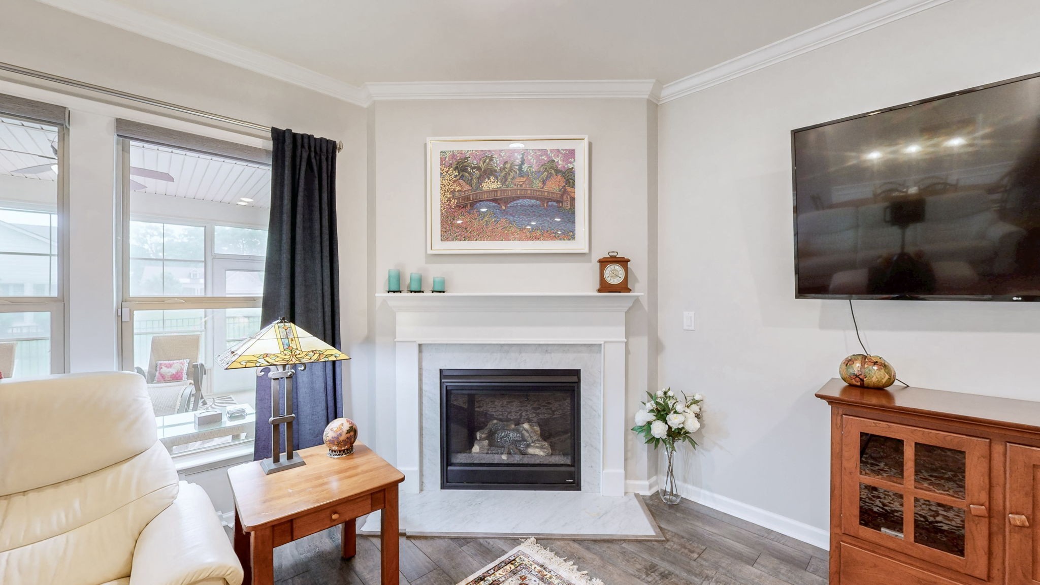 1106 Davidson Walk Spring Hill, TN 37174 - Photo 20 of 61 a living room with furniture a flat screen tv and a fireplace