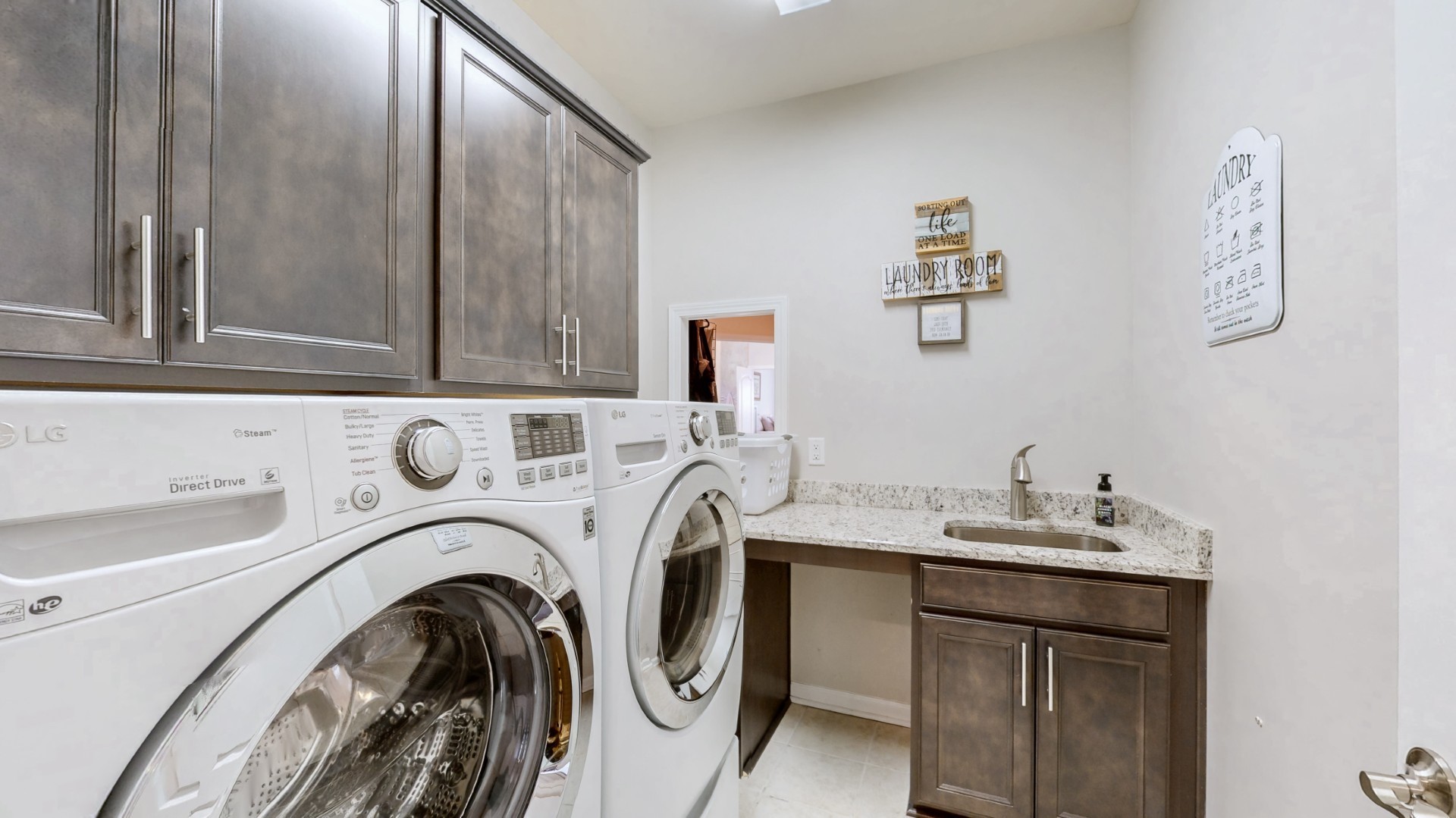 1106 Davidson Walk Spring Hill, TN 37174 - Photo 22 of 61 a utility room with sink dryer and washer