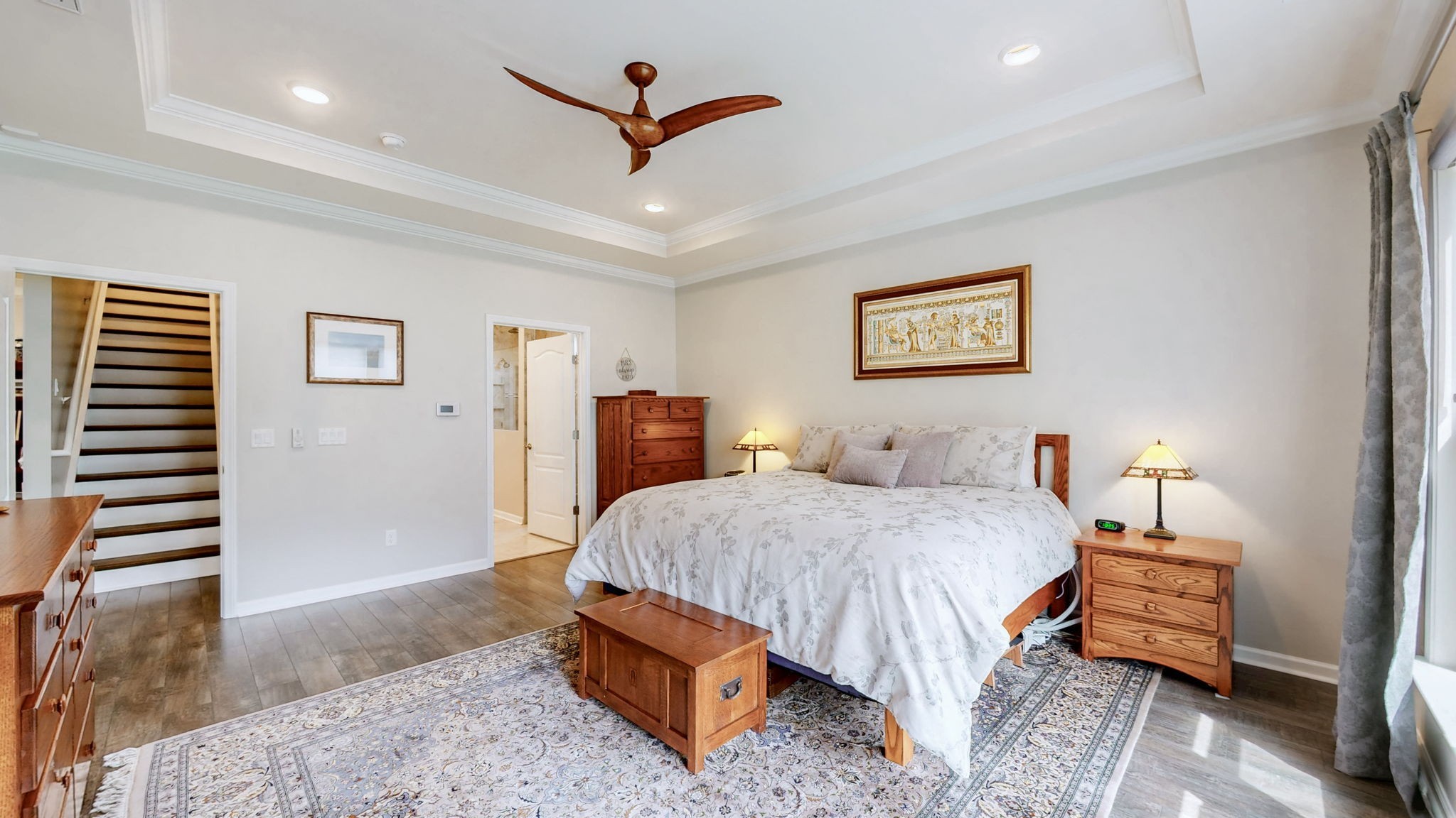 1106 Davidson Walk Spring Hill, TN 37174 - Photo 32 of 61 a spacious bedroom with a bed and a painting on the wall