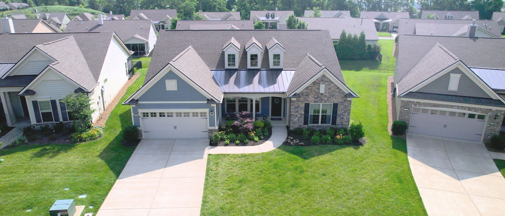 1106 Davidson Walk Spring Hill, TN 37174 - Photo 47 of 61 a front view of a house with garden