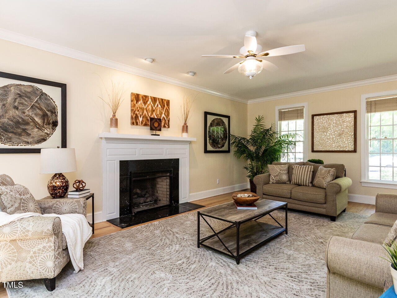 315 King George Loop Cary, NC 27511 - Photo 11 of 39 a living room with furniture and a fireplace