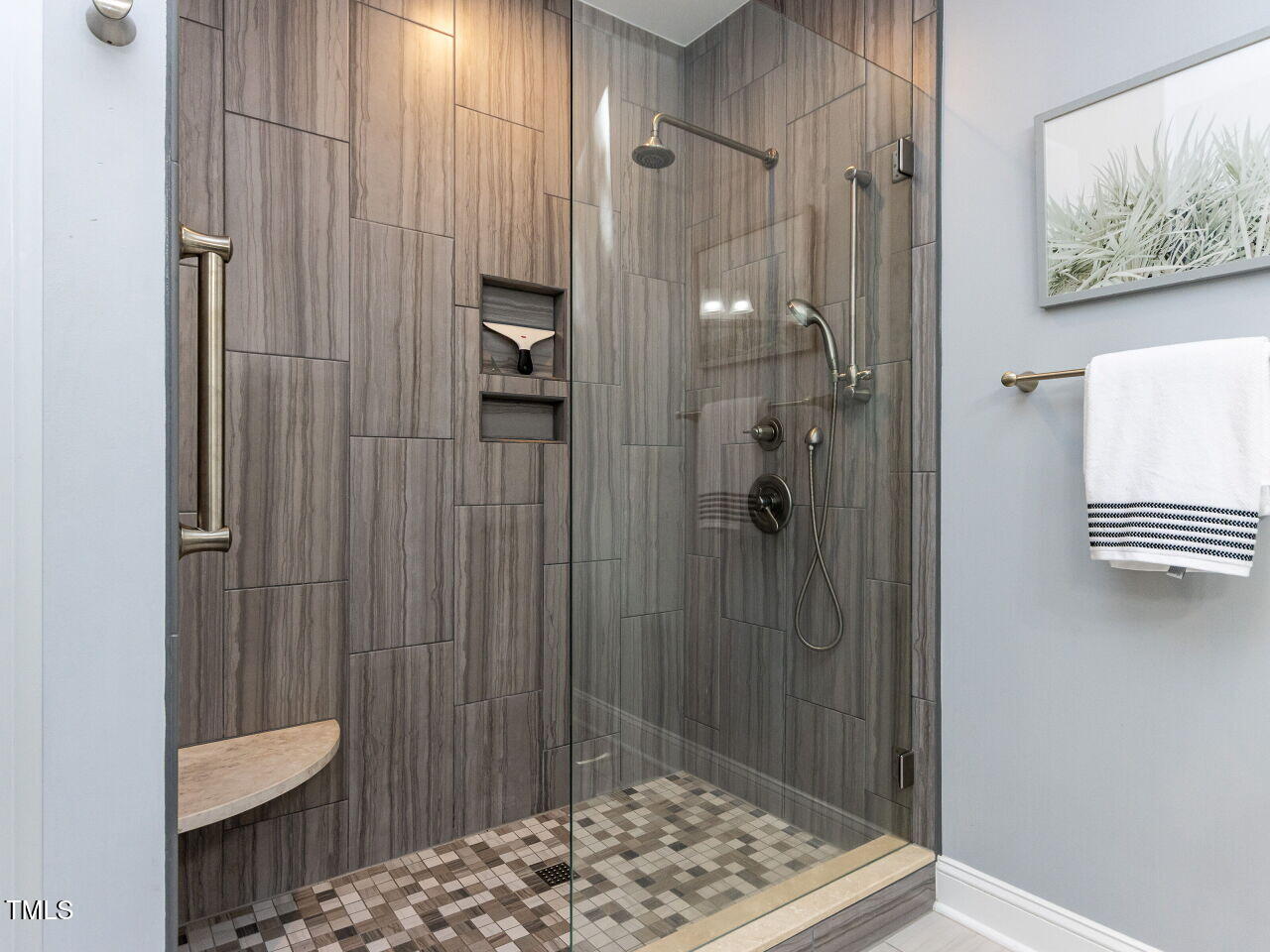 315 King George Loop Cary, NC 27511 - Photo 19 of 39 a bathroom with a shower and a sink