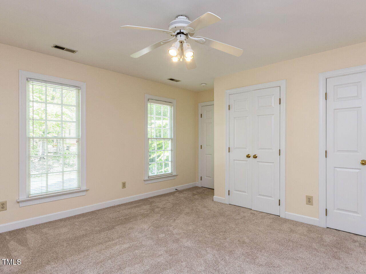 315 King George Loop Cary, NC 27511 - Photo 20 of 39 a view of an empty room with a window