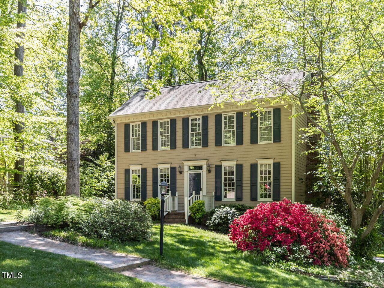 315 King George Loop Cary, NC 27511 - Photo 2 of 39 a front view of a house with garden