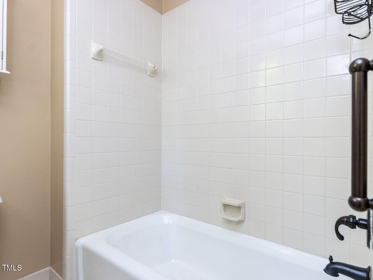 315 King George Loop Cary, NC 27511 - Photo 23 of 39 a bathroom with a white bath tub and a shower